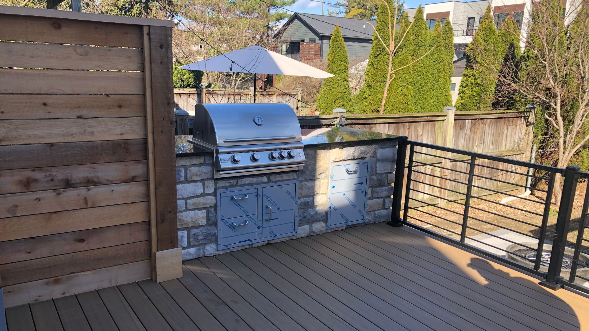 deck with integrated outdoor kitchen